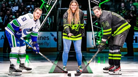 Women's sports pioneer Fuller drops puck at Stars game